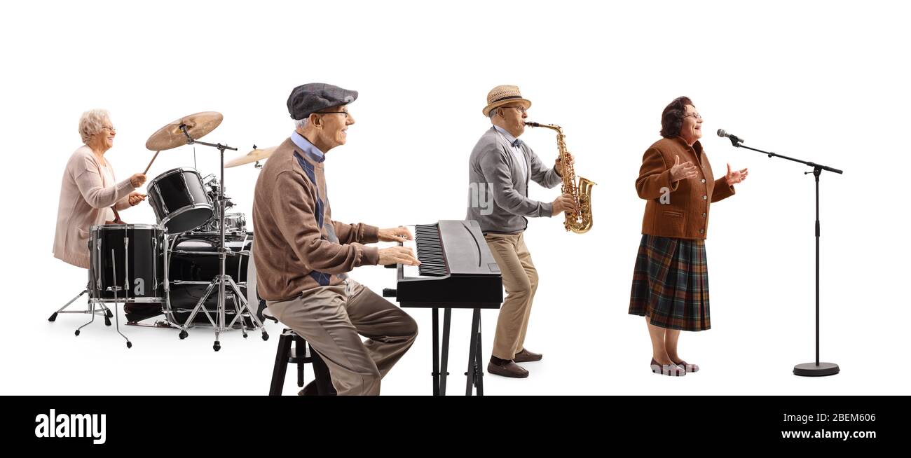 Music band of elderly keyboard player, drummer, sax player and a singer isolated on white background Stock Photo