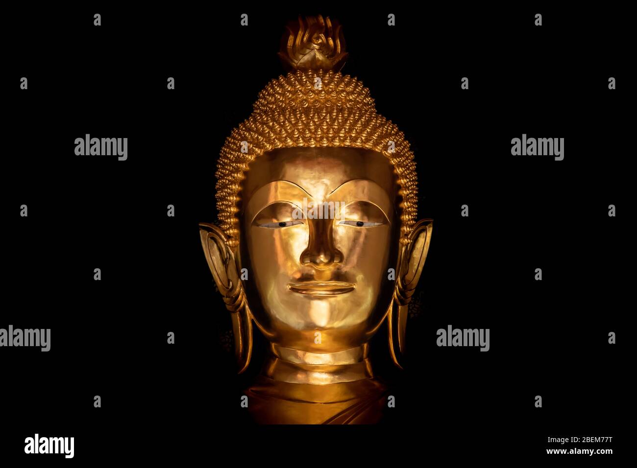 Mystical statue of Buddha, face of golden Buddha statue Stock Photo