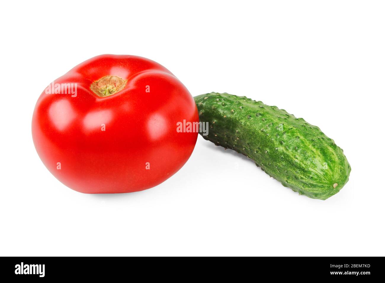 Fresh tomato and cucumber closeup isolated on white Stock Photo Alamy
