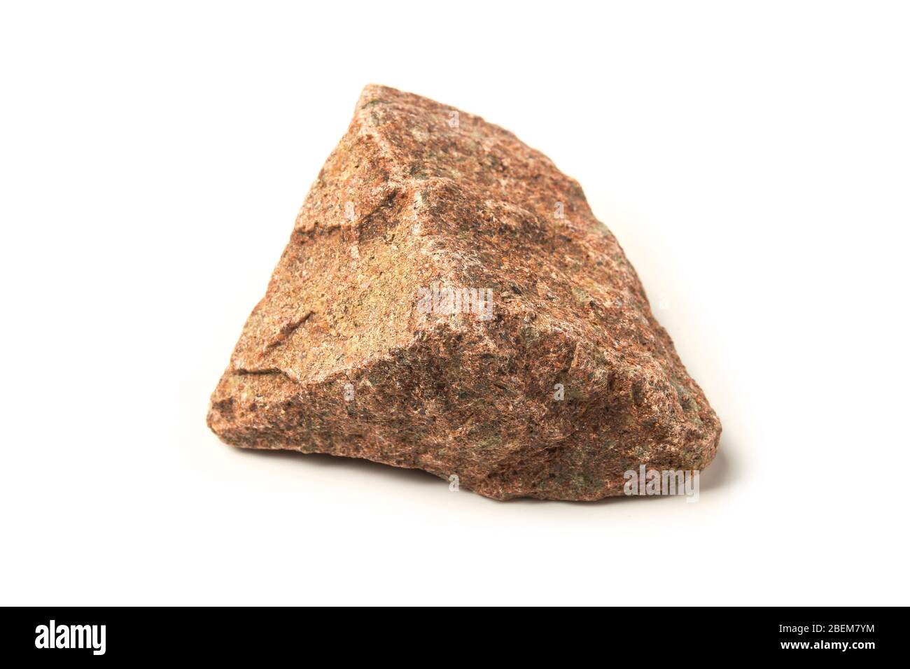 Red granite stone isolated on white background Stock Photo