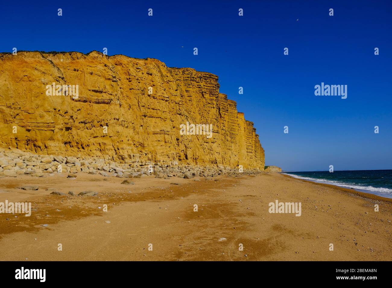 West Bay, Dorset, UK. 14th Apr, 2020. As the Coronavirus lockdown continues and tourist stay away from the normally crowded resort of West Bay the Office for Budget Responsibility says that the lockdown could shrink the GDP by 35%. Credit: Tom Corban/Alamy Live News Stock Photo
