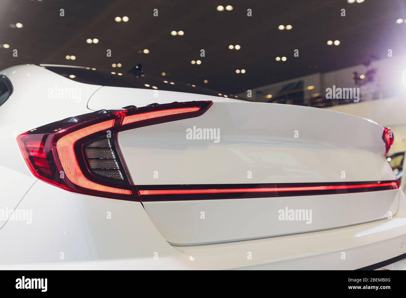 Car detail. New led taillight by night. The rear lights of the car, in  hybrid sports car. Developed Car's rear brake light Stock Photo - Alamy