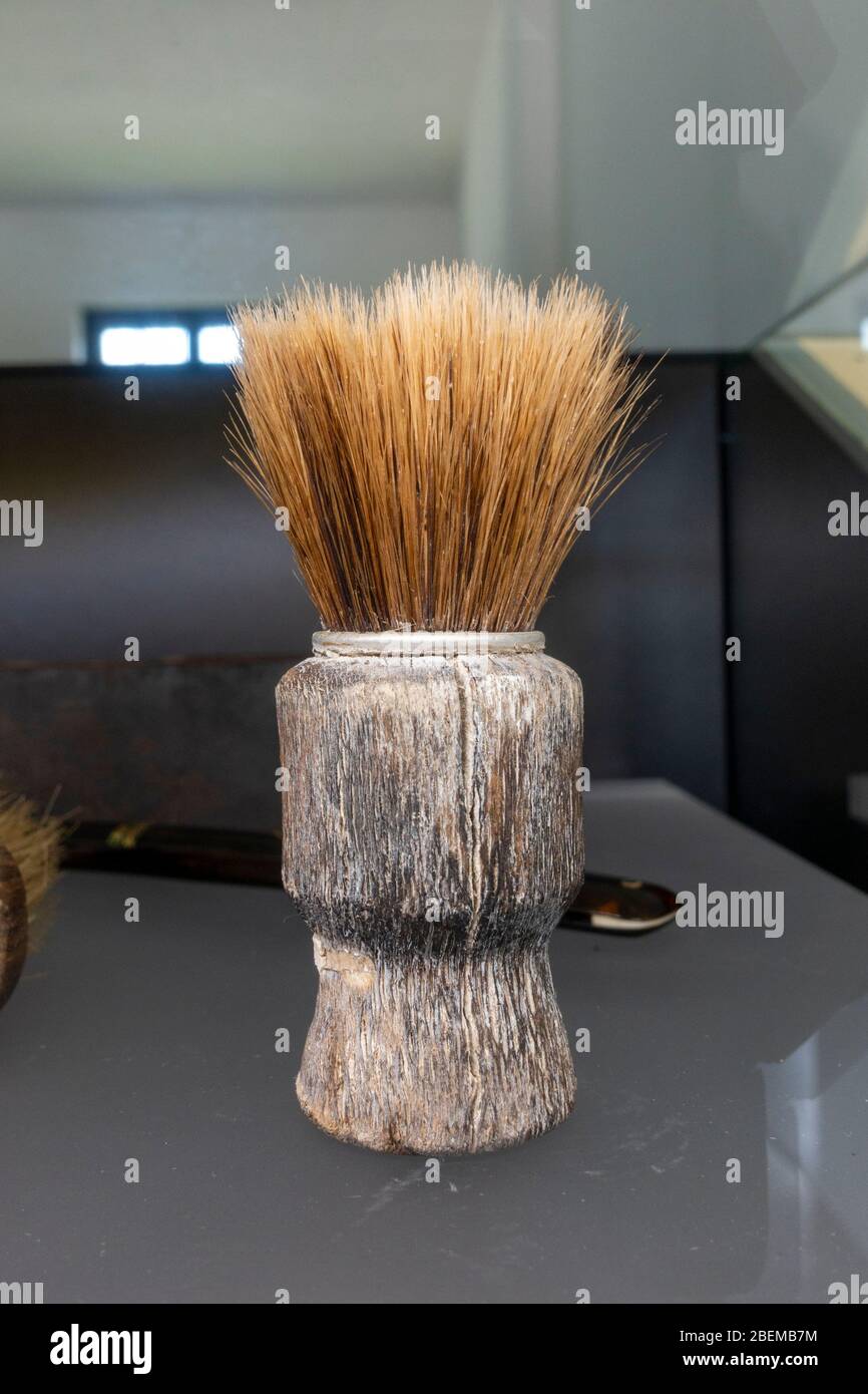 Hair shaving brush used by prisoner who served as a barber on display