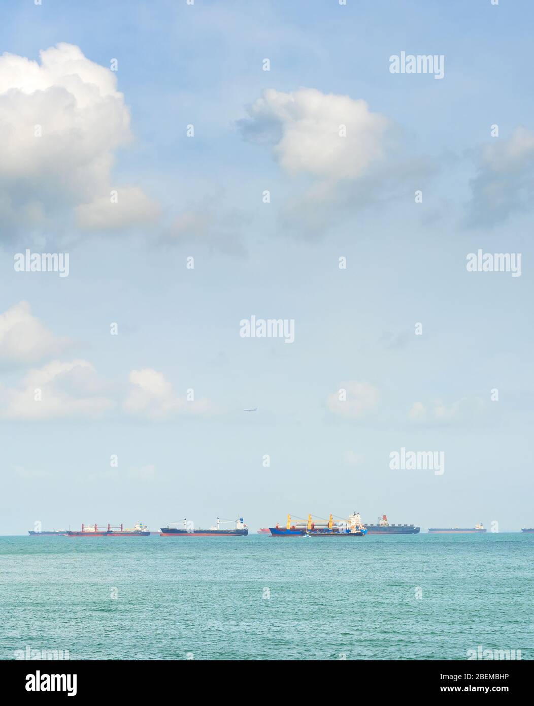 Industrial cargo shipping tankers in Singapore harbor Stock Photo