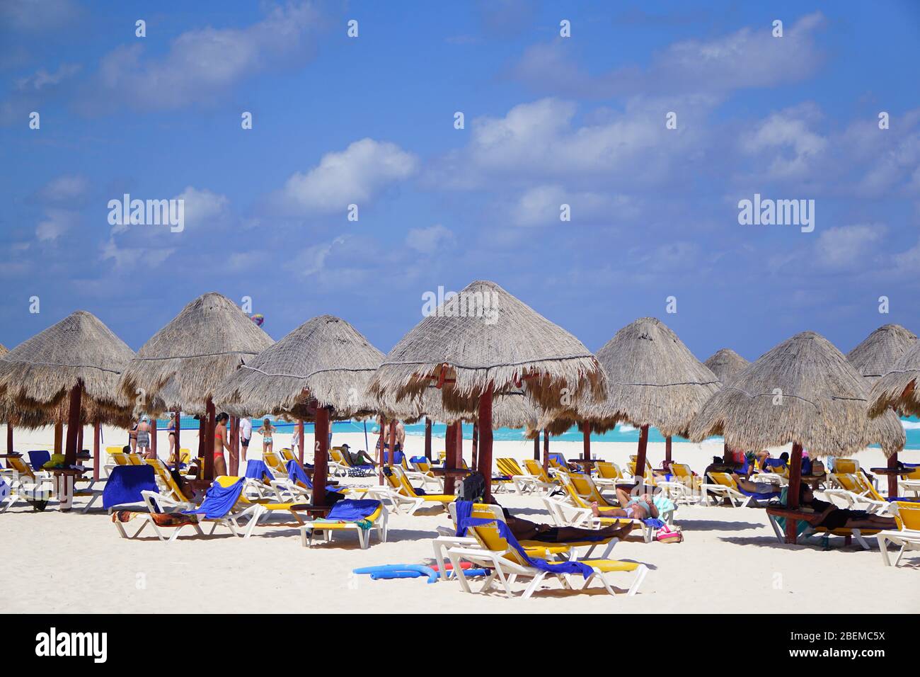 Quiet beach, blue sky, turquoise water, Cancun Mexico Stock Photo