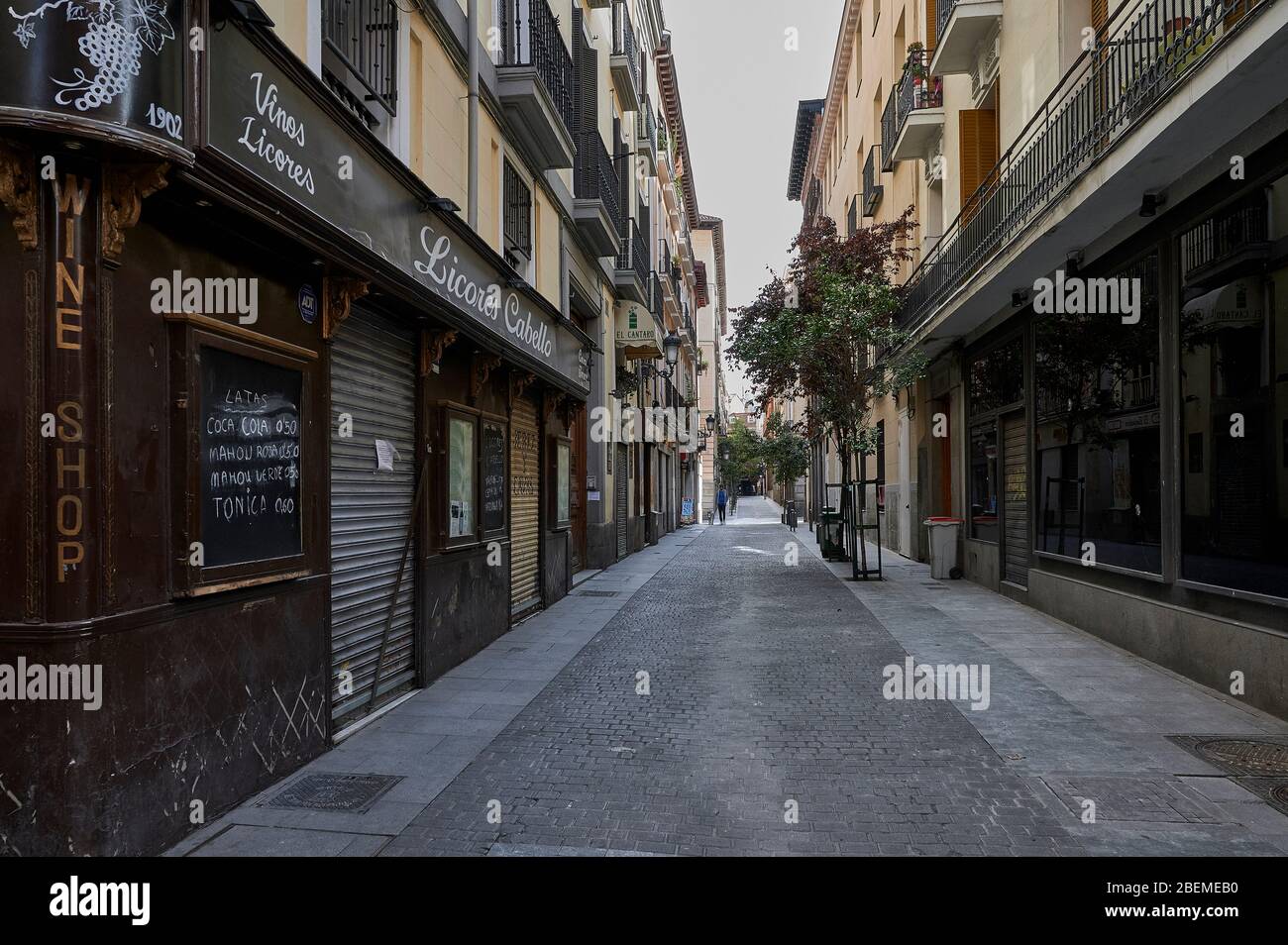 Madrid, Spain - April 11, 2020 Empty streets of people, shops and restaurants and bars closed by the State of Alarm for Covid-19. Stock Photo