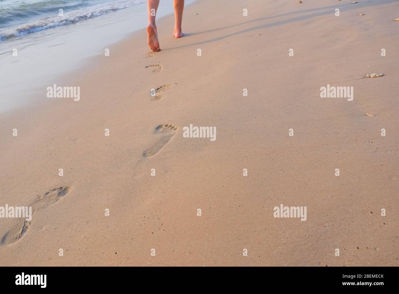 Male feet walking on sand hi-res stock photography and images - Alamy