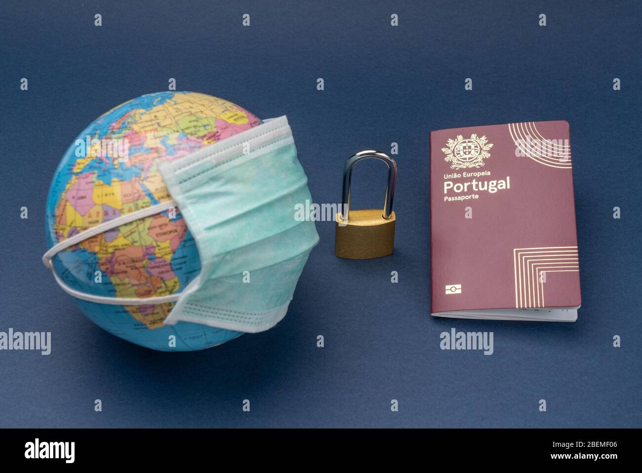 Passport with world map globe on brown cover. Biometric