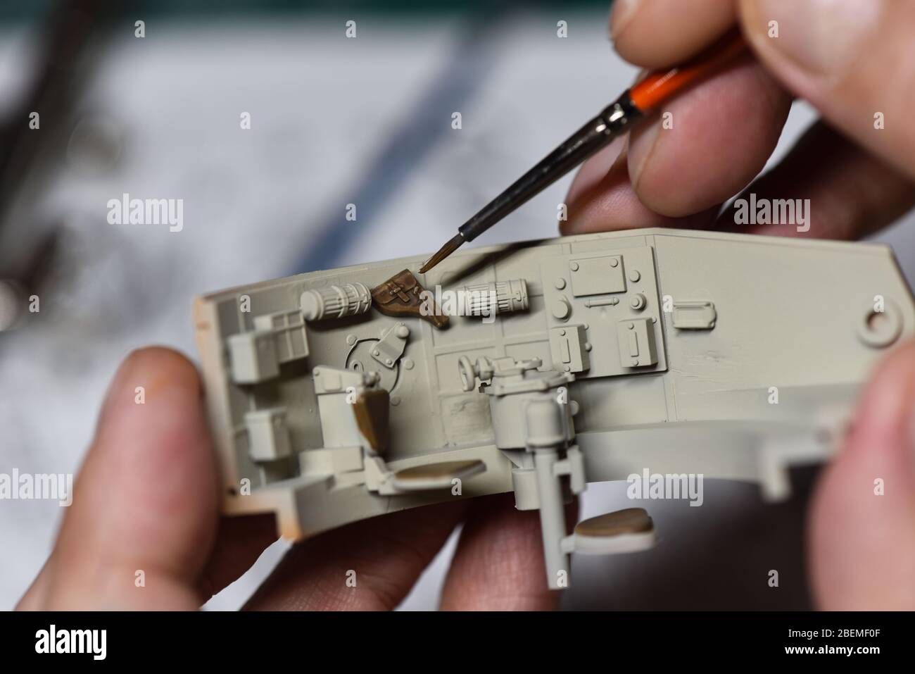 Plastic Modeling and model building. Close up of male hands painting