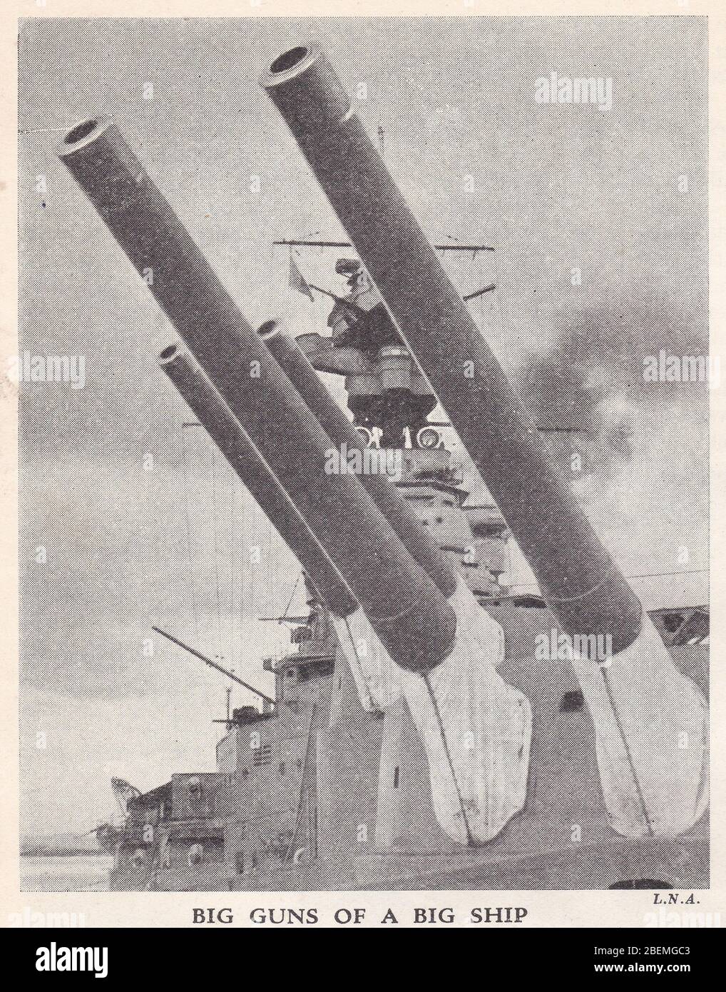Vintage 1930s black and white photo of HMS Hood showing her armament eight guns. Stock Photo