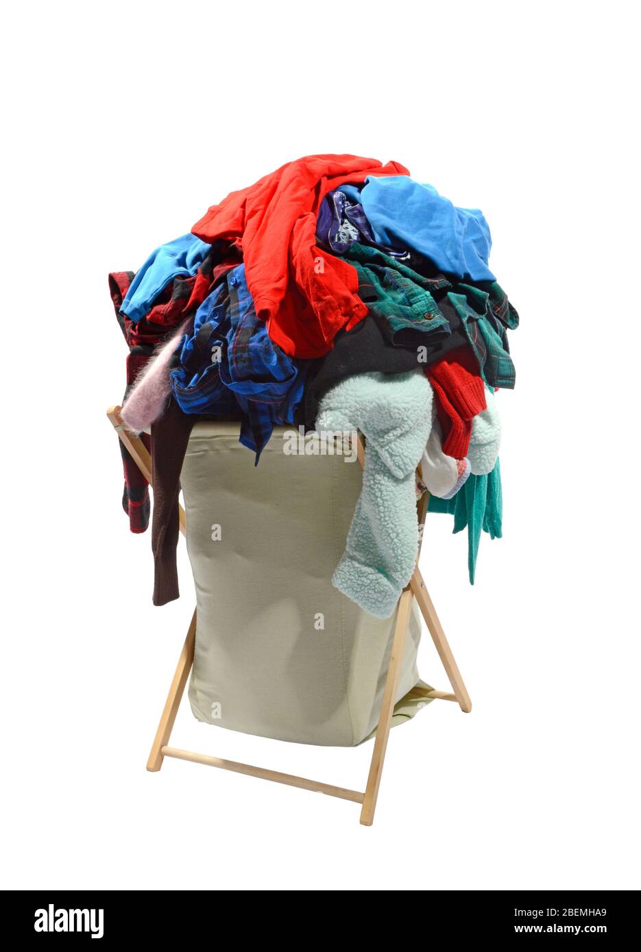 Vertical Shot Of A Big Bulging Cloth Laundry Hamper About Ready To Fall Over Isolated On White Stock Photo Alamy
