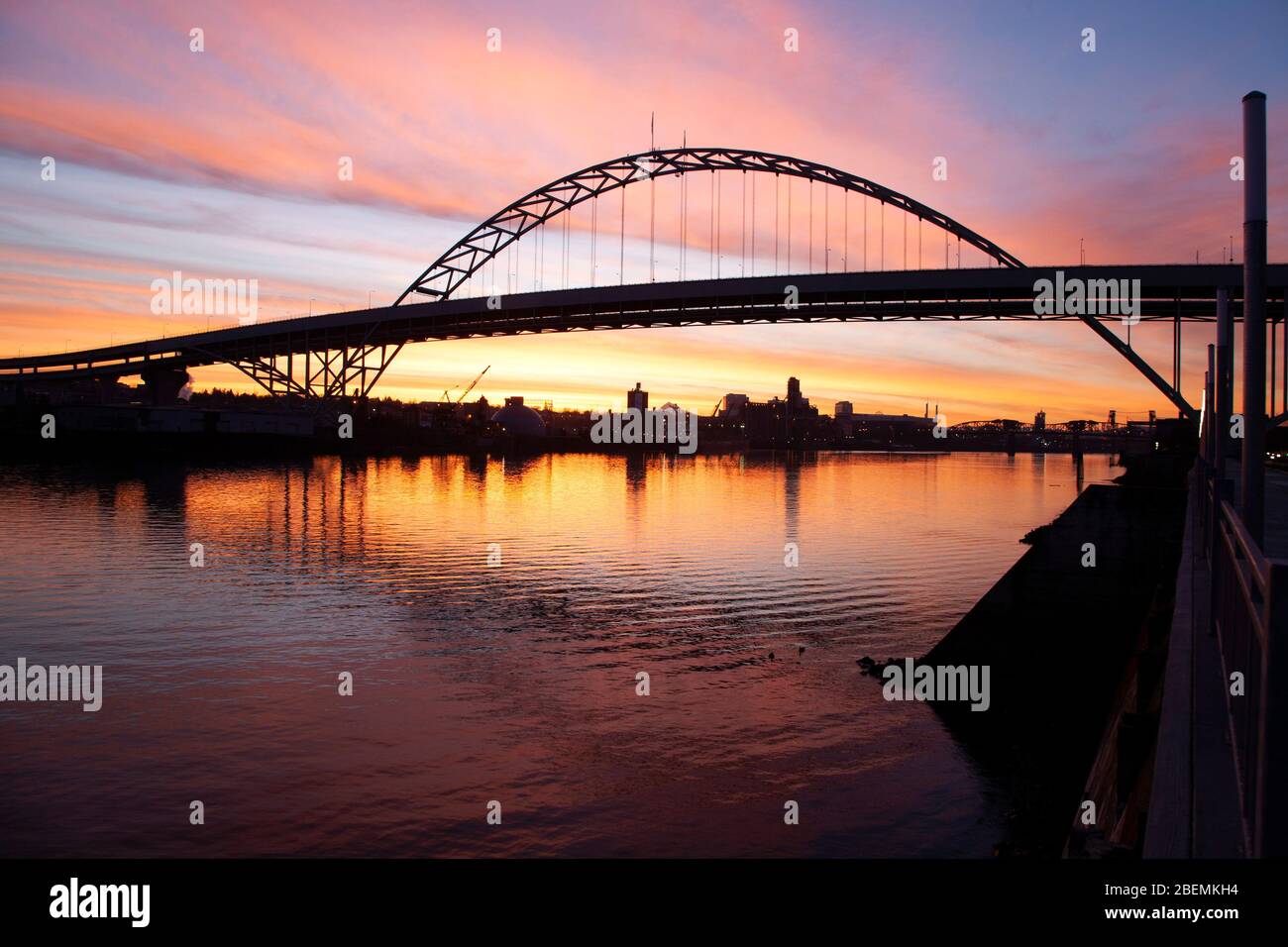 Fremont Bridge in Portland with a pink sunrise sky Stock Photo