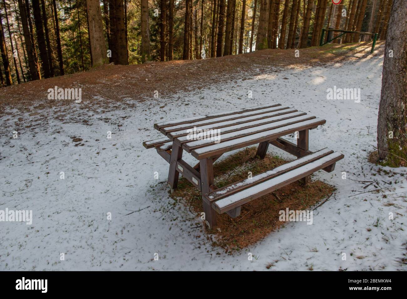 table with bench in the snowy park Stock Photo
