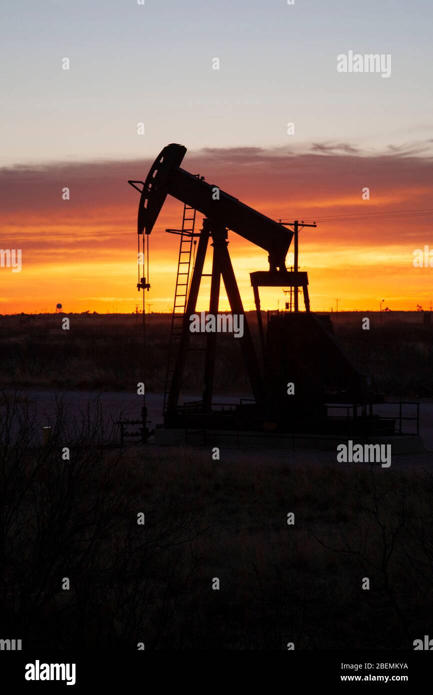 Oil pumpjack at work at dawn in the rich Permian Basin of Western Texas