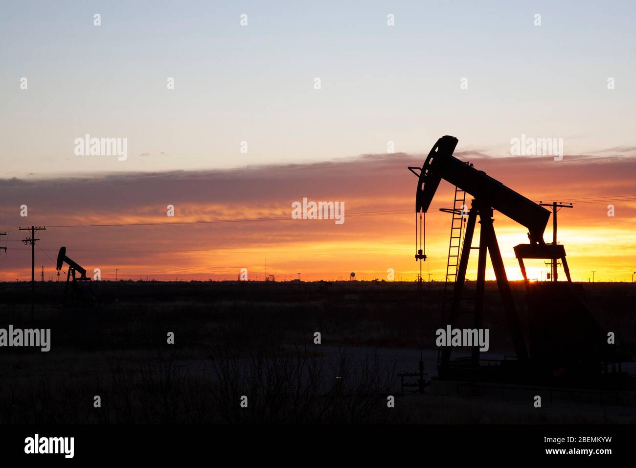 Oil pumpjack at work at dawn in the rich Permian Basin of Western Texas Stock Photo
