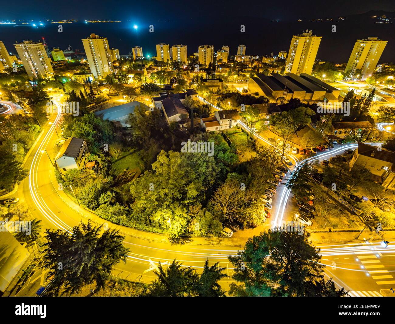 Night scape landscape city street streets sea in background Rijeka suburb area Zamet in Croatia Stock Photo