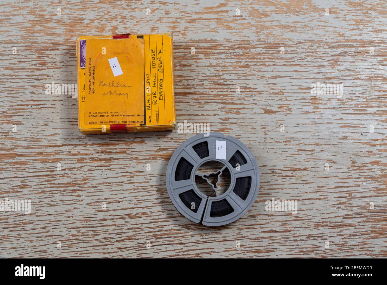 A small spool of 8mm film with its cardboard box Stock Photo - Alamy
