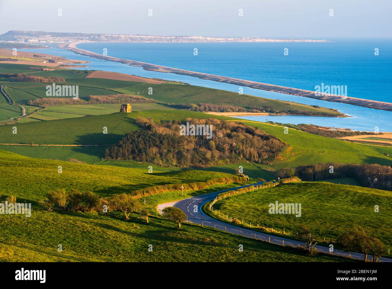 Abbotsbury, Dorset, UK. 14th April 2020. UK Weather. View of St Catherine’s Chapel and The Fleet