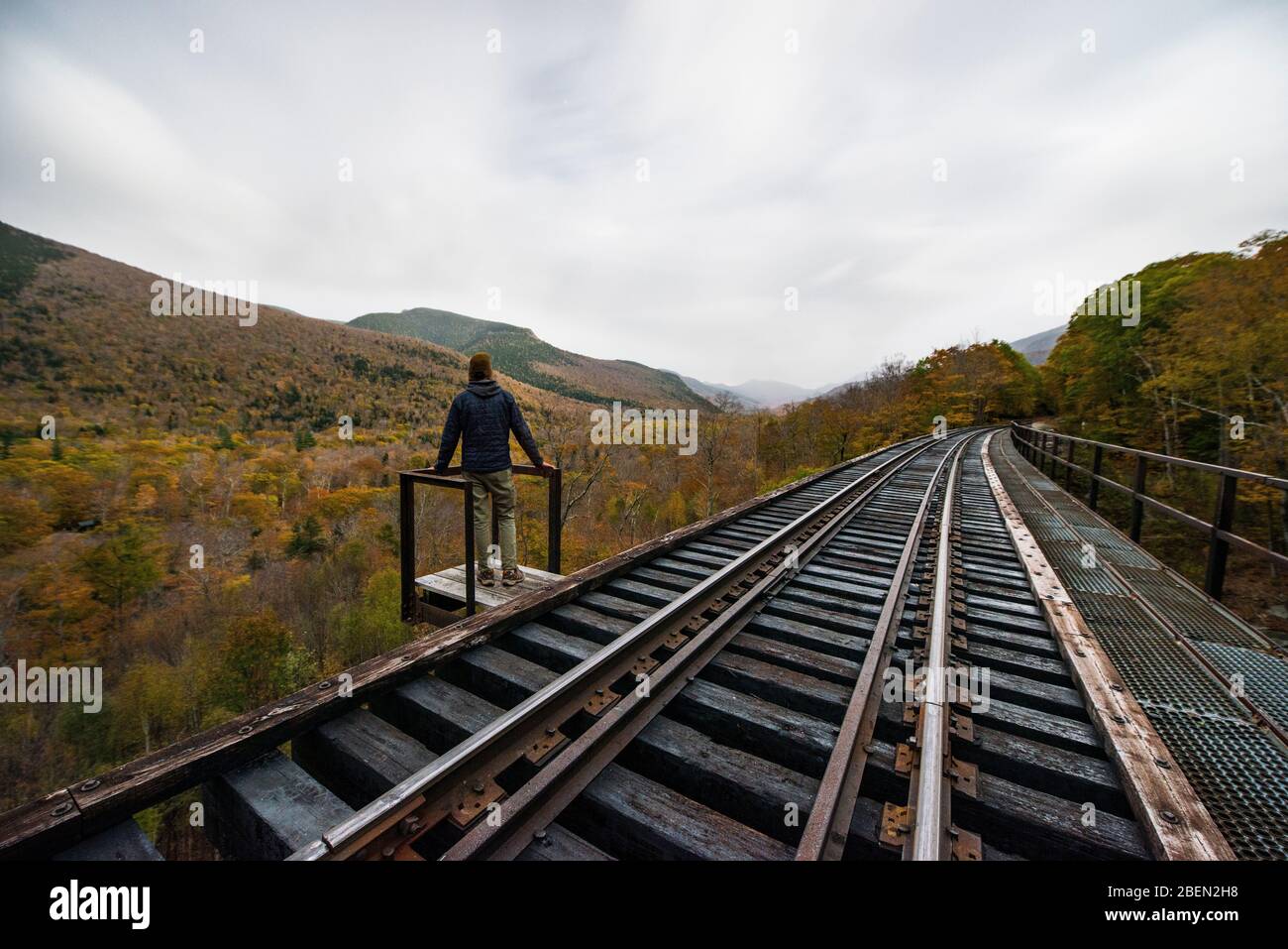 Abandoned Railroad Trestle high above New england autumn forest Stock Photo