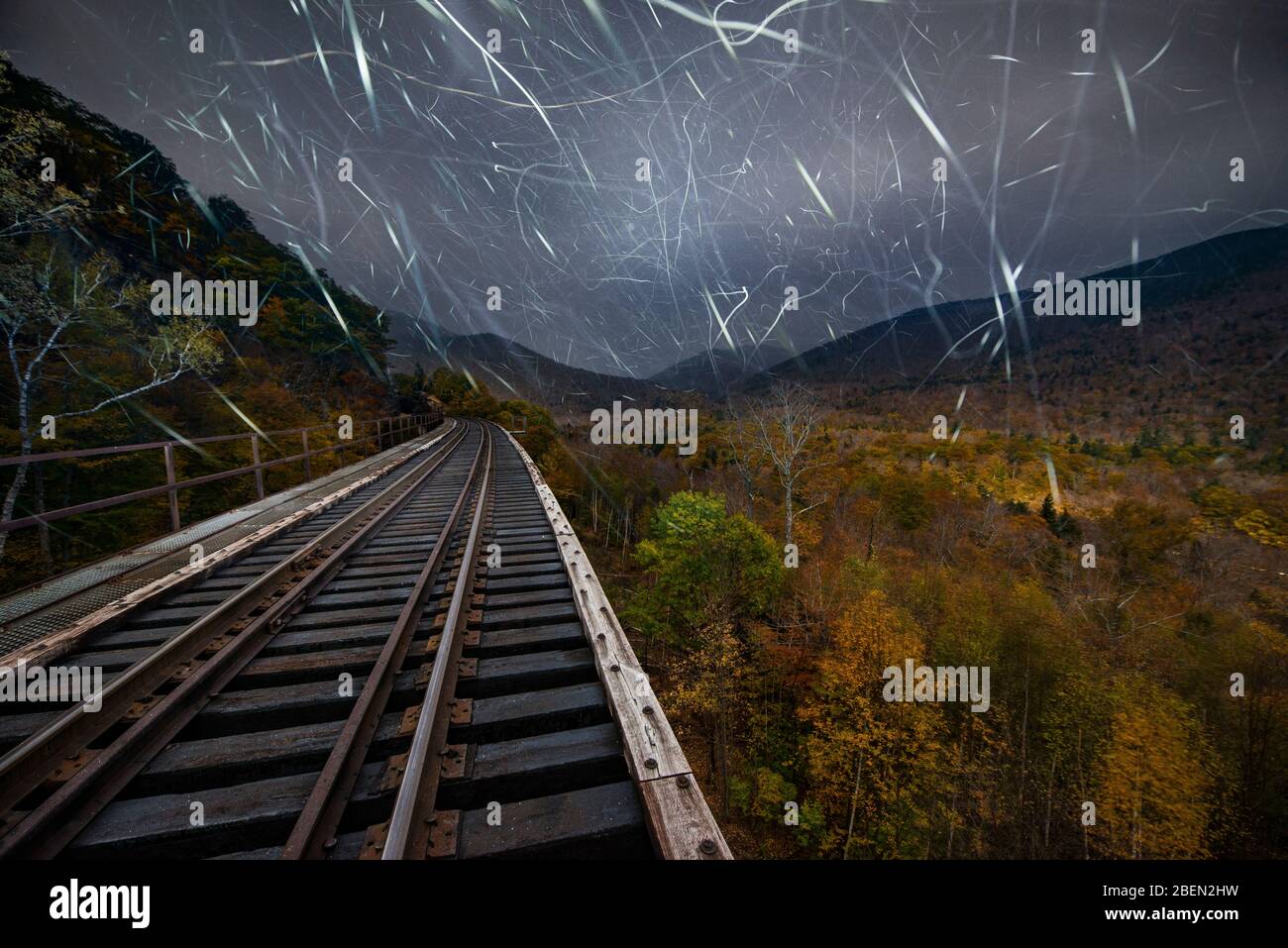 Abandoned Railroad Trestle high above New england autumn forest Stock Photo