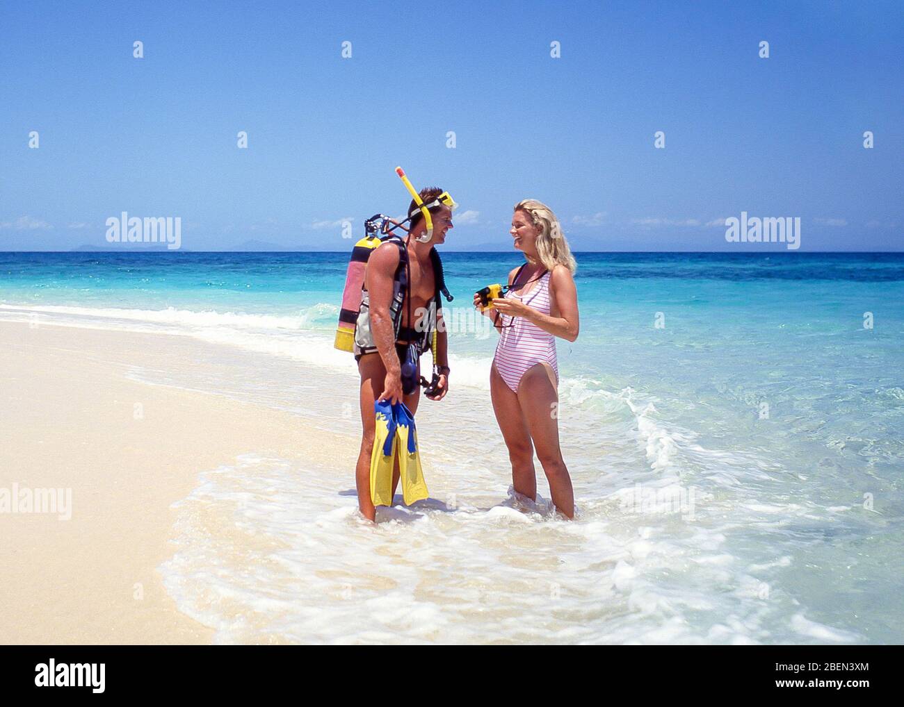 Couple scuba diving, Kuda Bandos, Kaafu Atoll, Republic of Maldives Stock Photo