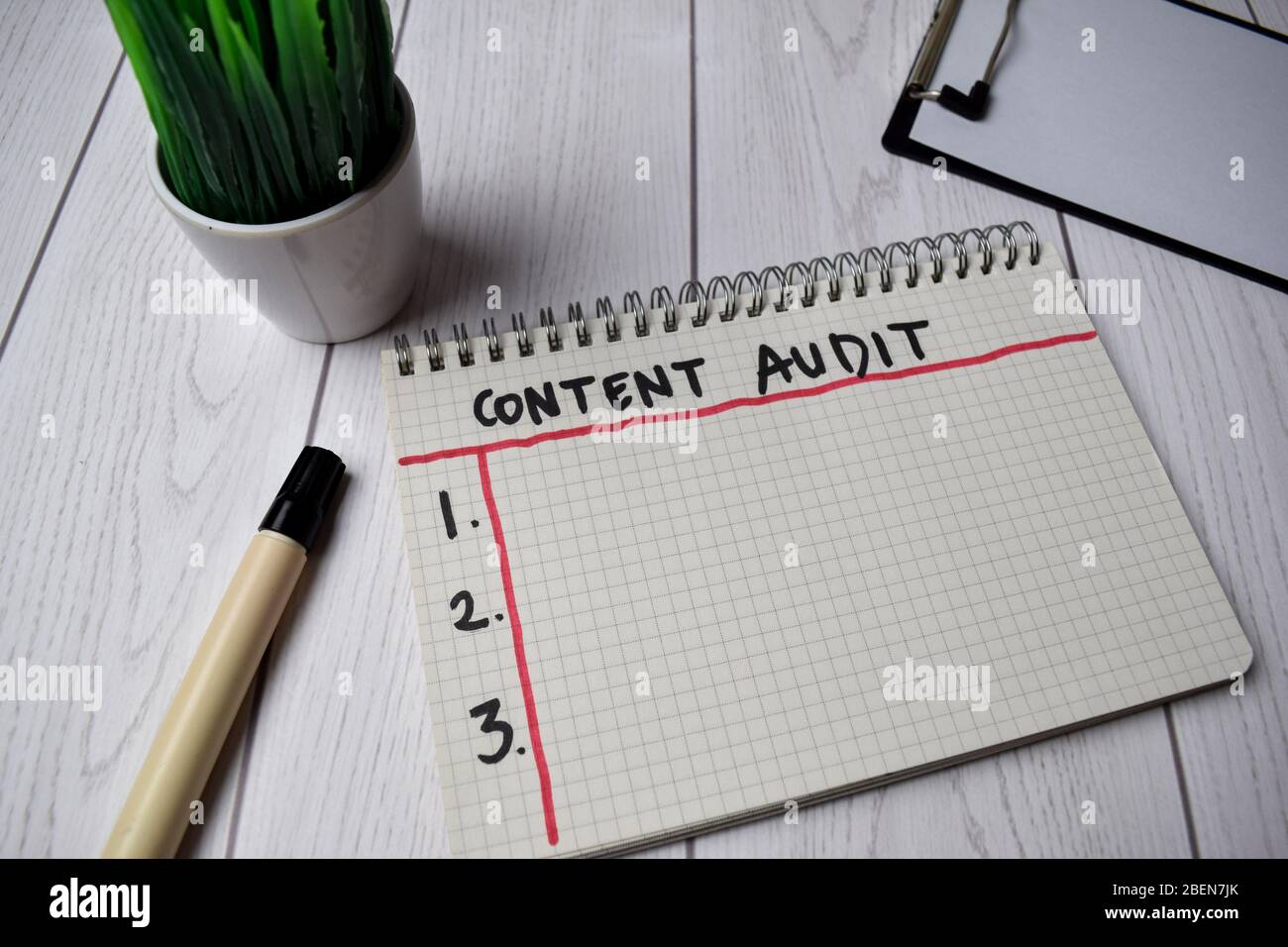 Content Audit write on a book isolated on Office Desk Stock Photo