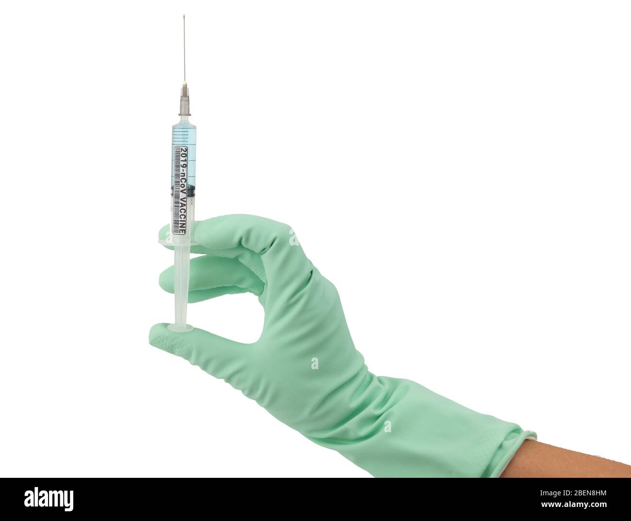 Doctor hand in medical gloves holding a syringe with coronavirus vaccine. Stock Photo
