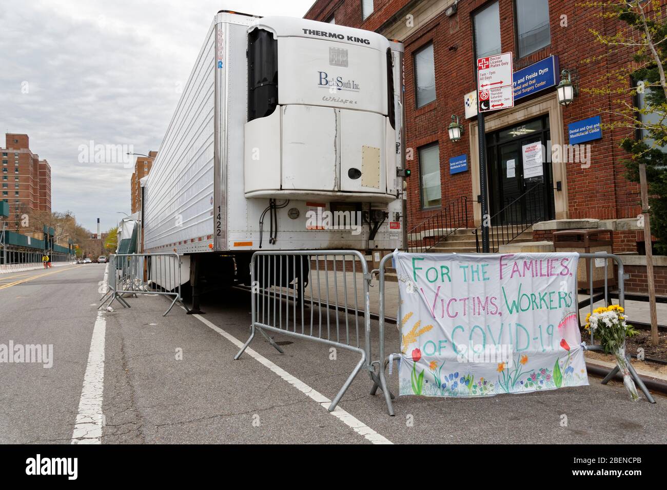 Thank you sign placed next to a refrigerated dead body truck at a NYC hospital on April 14 2019 Stock Photo