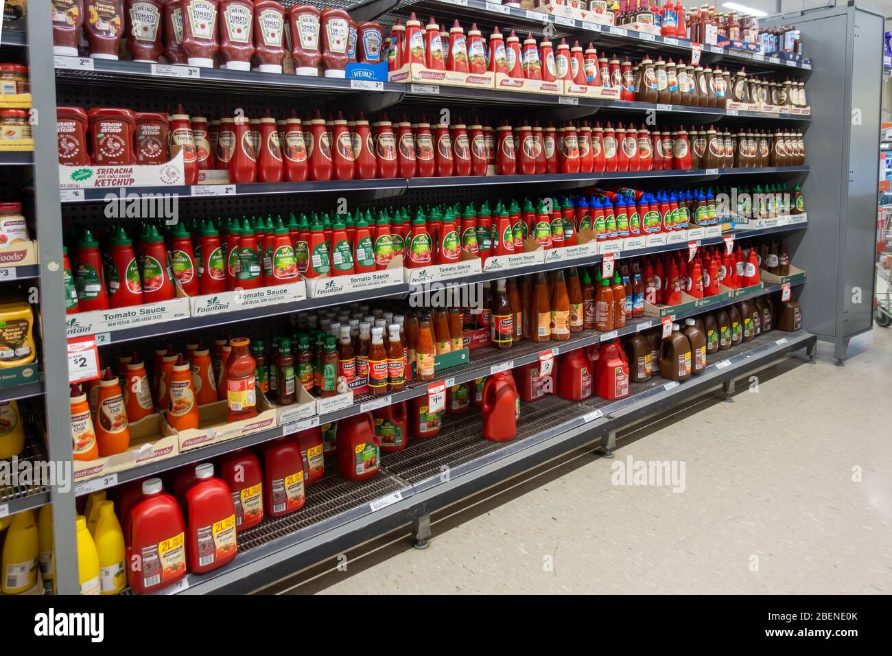 Bottles of sauce in an Australian supermarket. Stock Photo