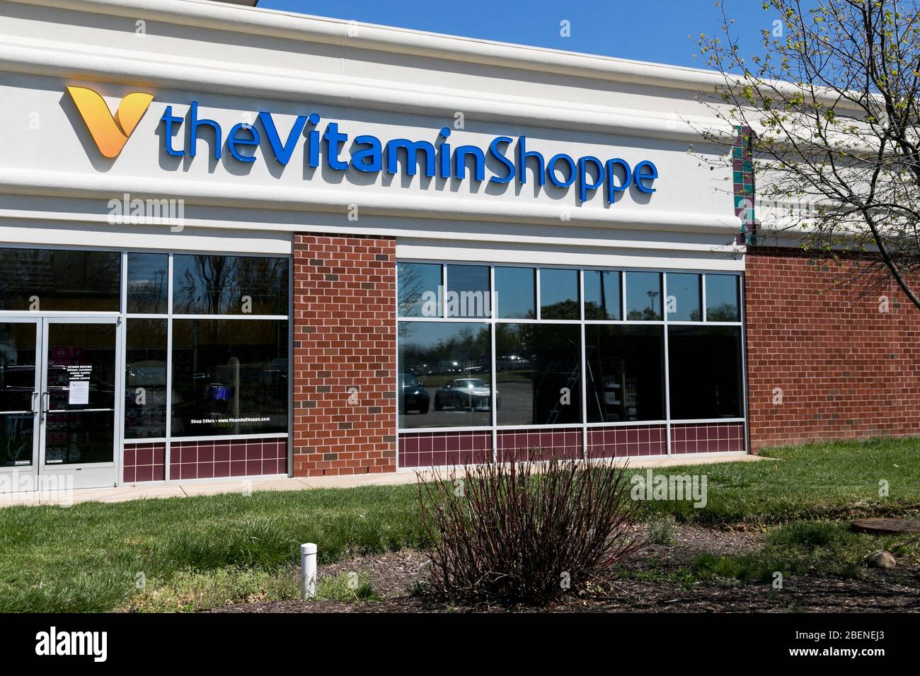 A logo sign outside of a The Vitamin Shoppe retail store location in
