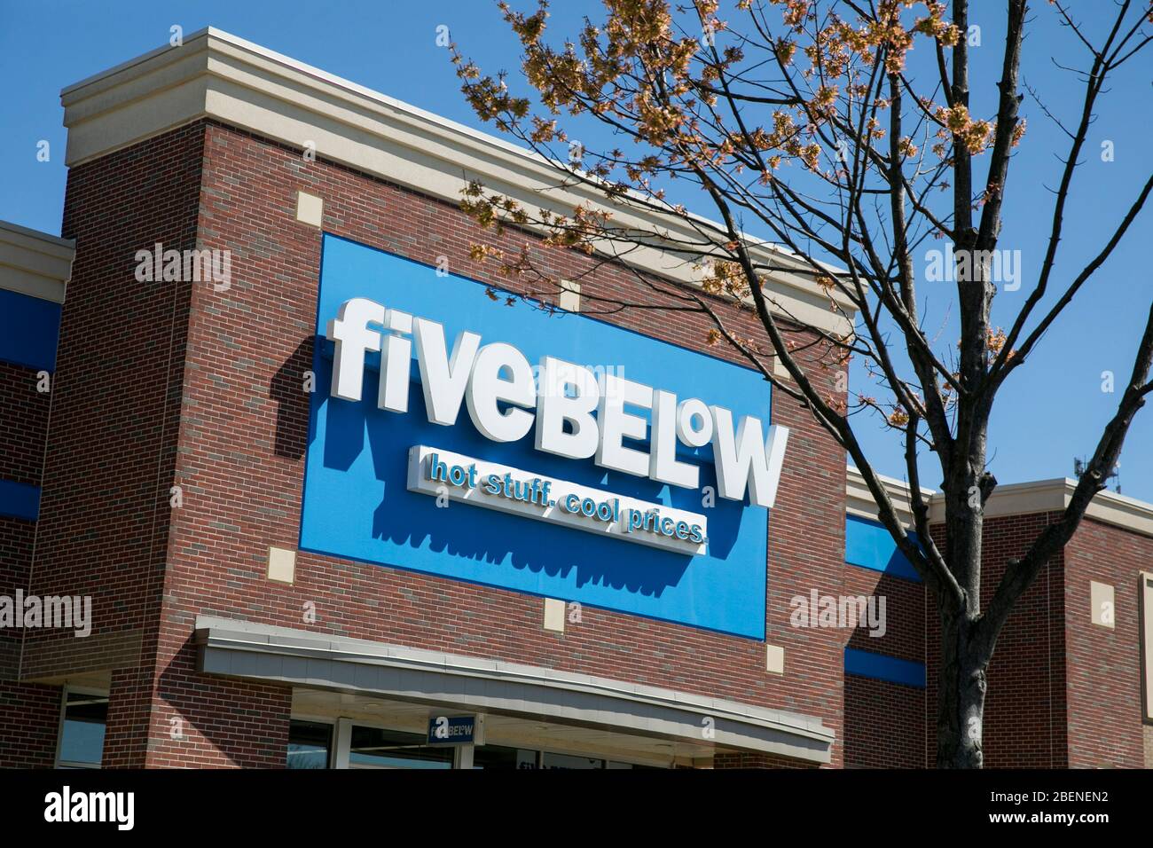 A logo sign outside of a Five Below retail store location in Fredericksburg, Virginia on April 2, 2020. Stock Photo