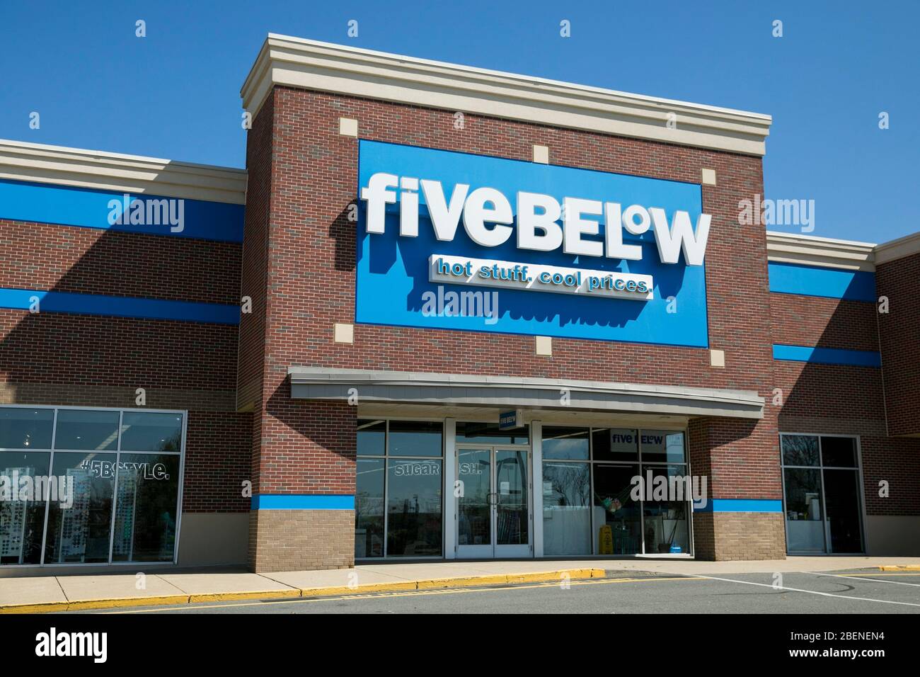 A logo sign outside of a Five Below retail store location in Fredericksburg, Virginia on April 2, 2020. Stock Photo