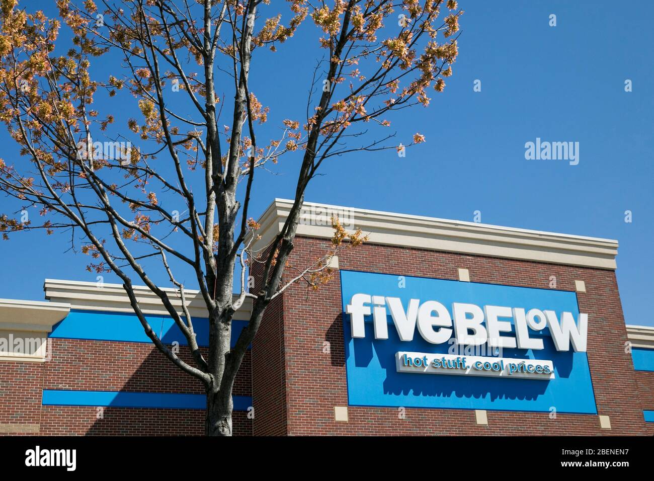 A logo sign outside of a Five Below retail store location in Fredericksburg, Virginia on April 2, 2020. Stock Photo