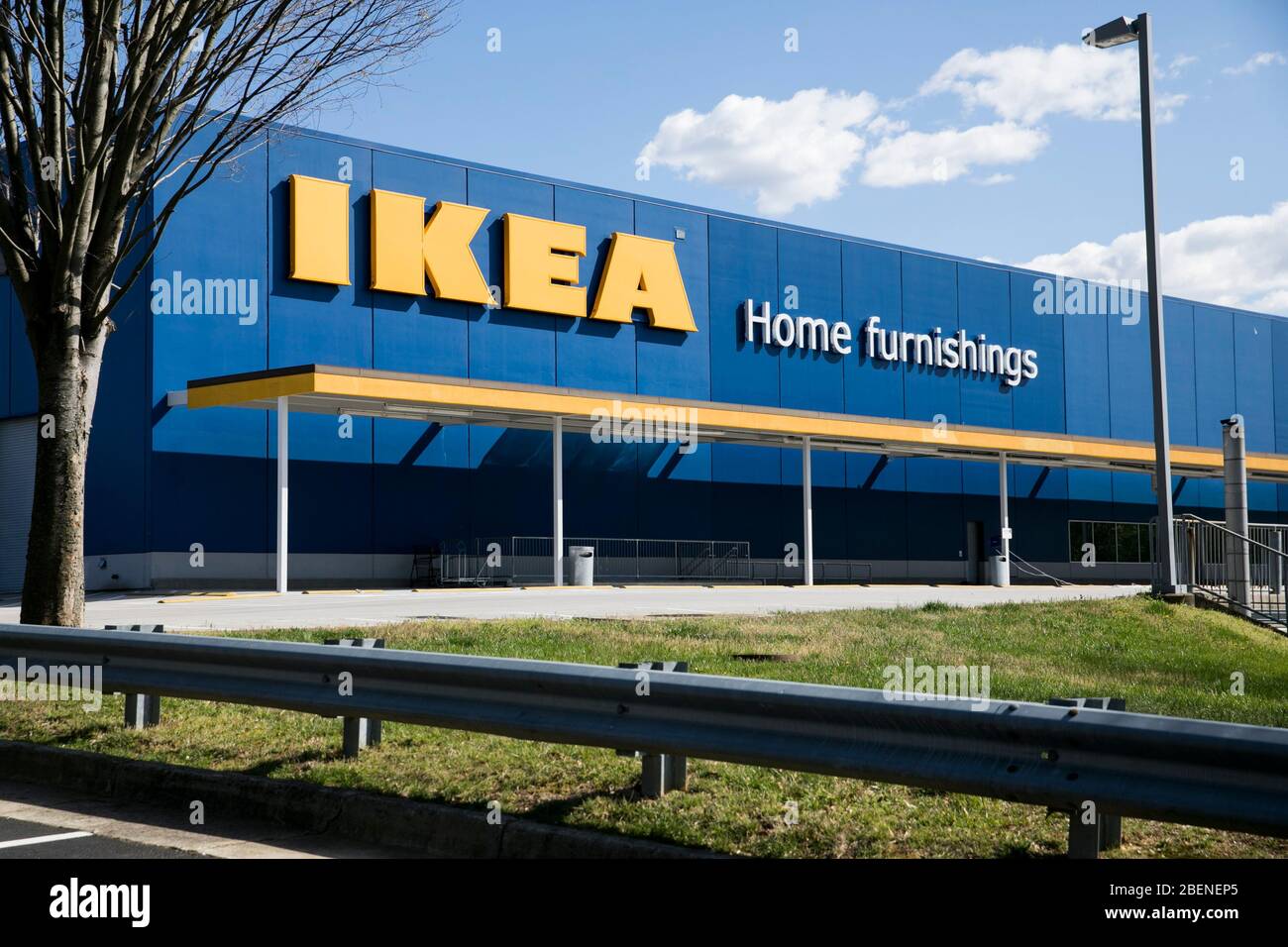 A logo sign outside of a Ikea retail store location in Woodbridge