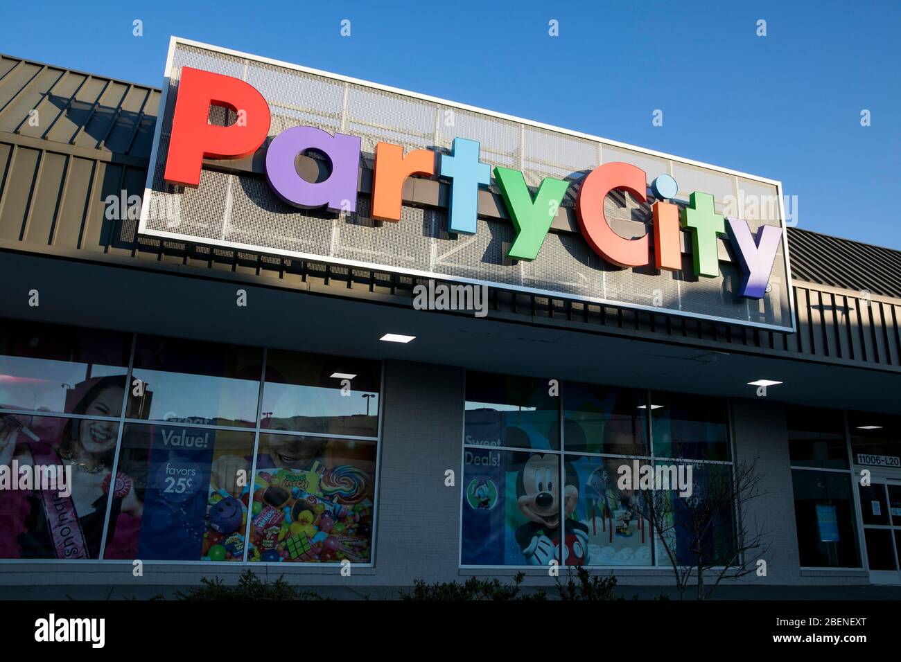 A logo sign outside of a Party City retail store location in Wheaton, Maryland on April 2, 2020. Stock Photo