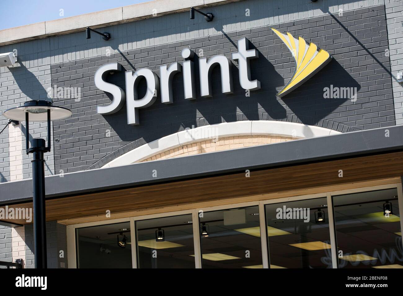 A logo sign outside of a Sprint retail store location in Baltimore, Maryland on April 6, 2020. Stock Photo