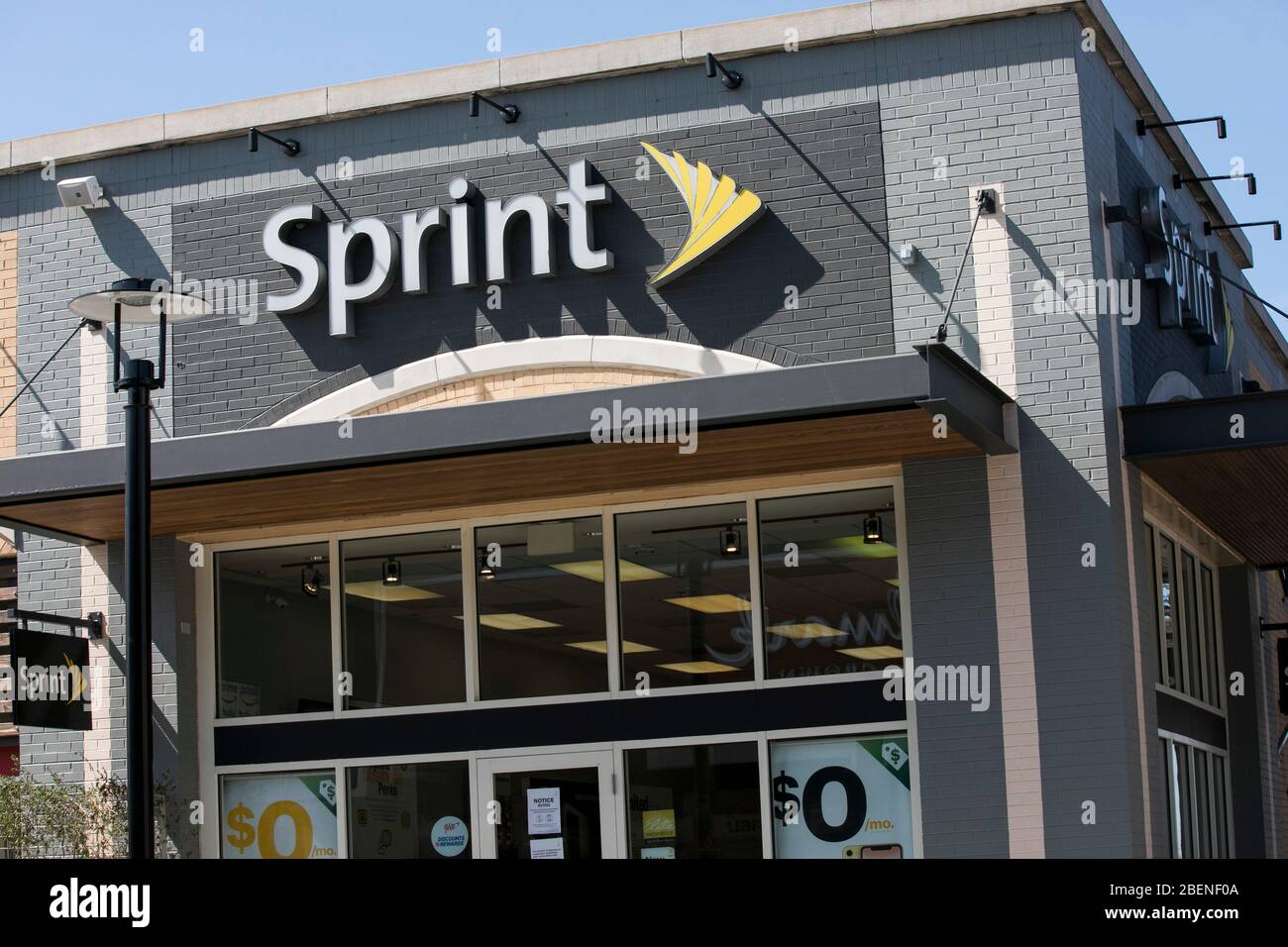 A logo sign outside of a Sprint retail store location in Baltimore, Maryland on April 6, 2020. Stock Photo