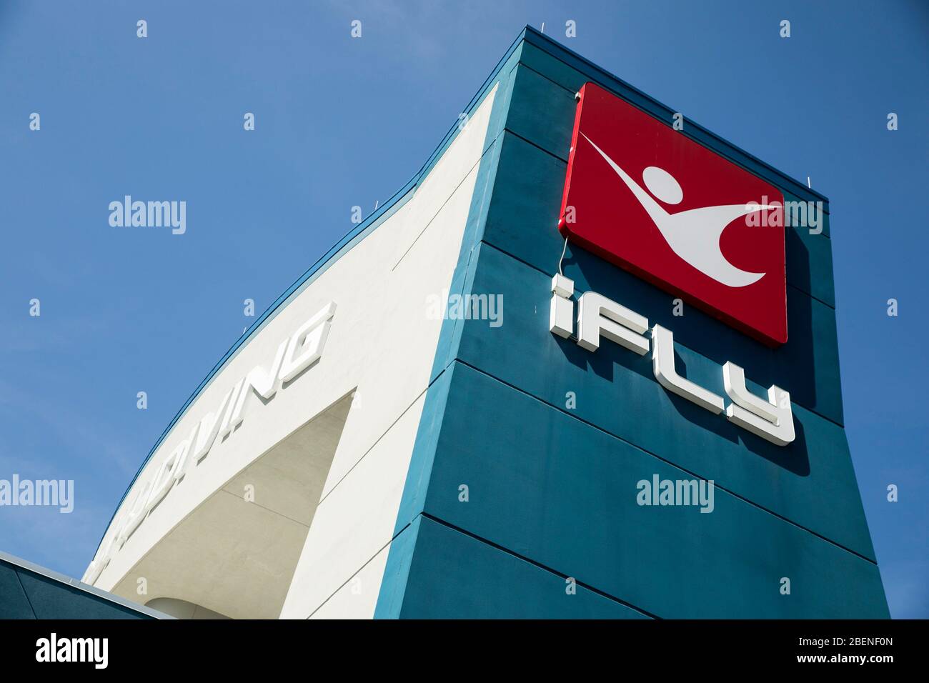 A logo sign outside of a iFly Indoor Skydiving location in Baltimore, Maryland on April 6, 2020. Stock Photo