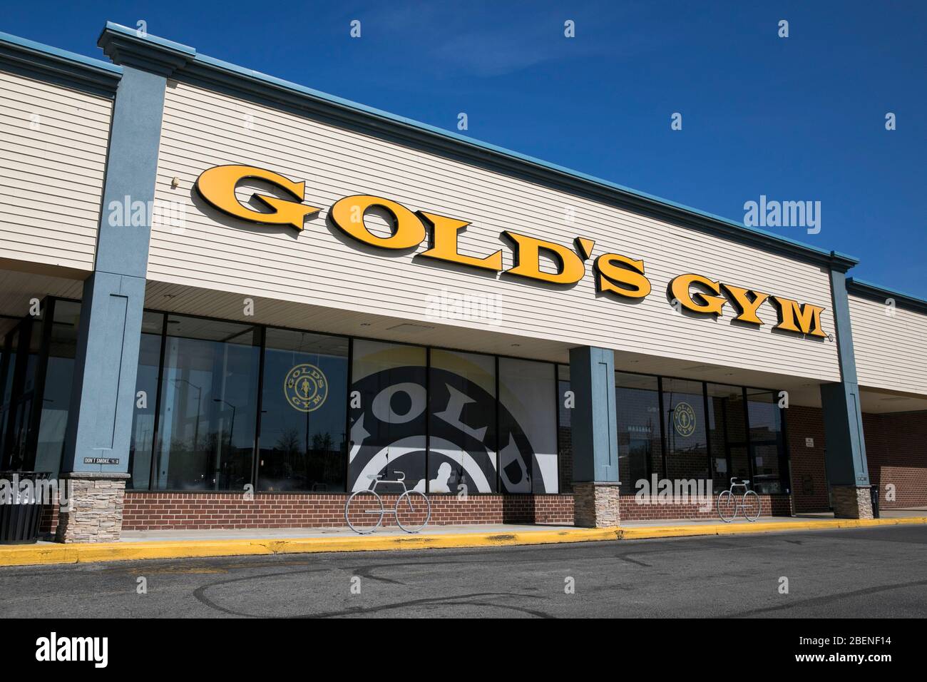 A logo sign outside of a Gold's Gym location in Dundalk, Maryland