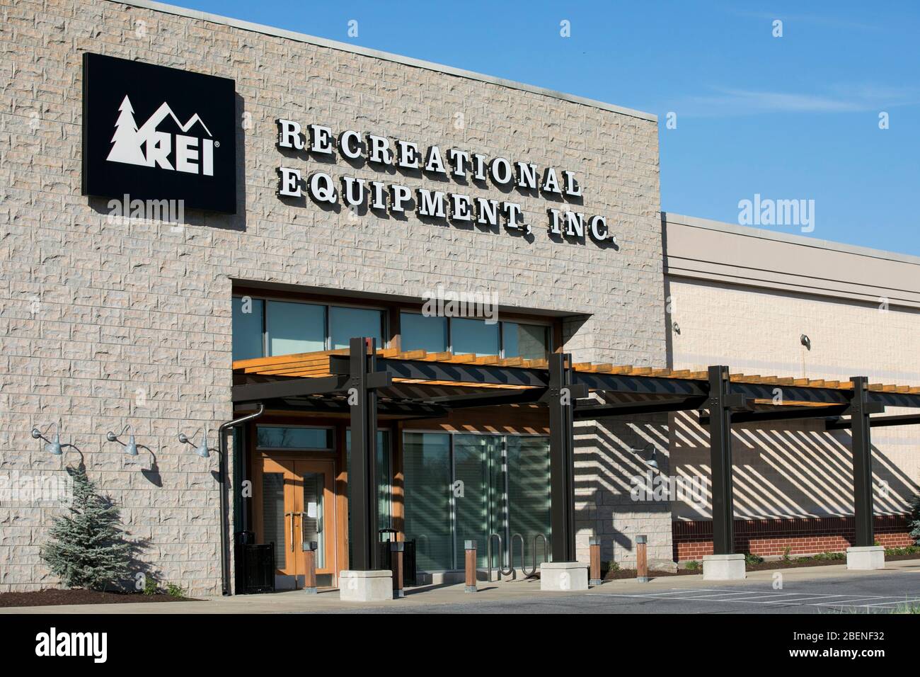 A logo sign outside of a Recreational Equipment, Inc., (REI) retail store location in Columbia, Maryland on April 6, 2020. Stock Photo