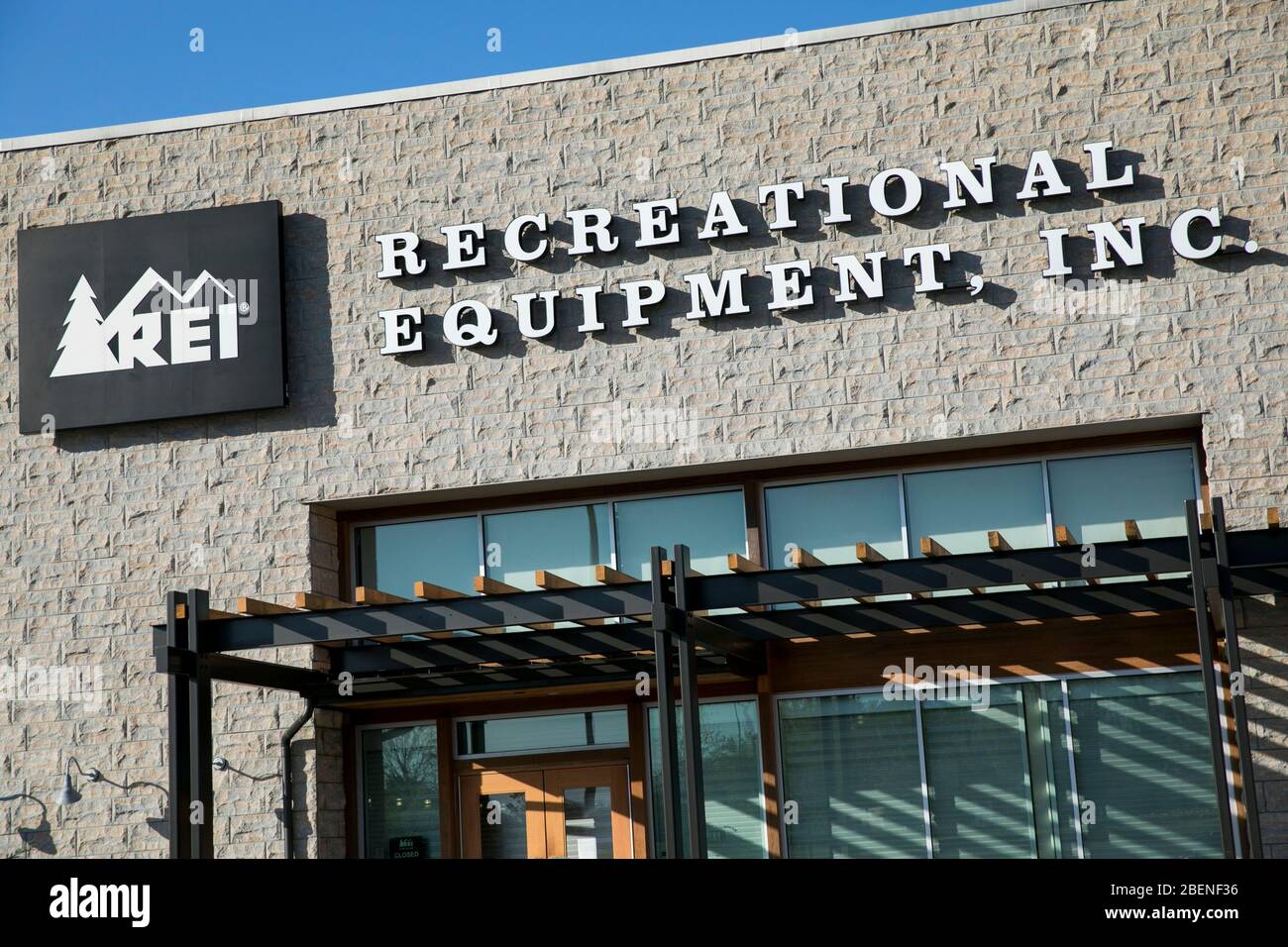 A logo sign outside of a Recreational Equipment, Inc., (REI) retail store location in Columbia, Maryland on April 6, 2020. Stock Photo