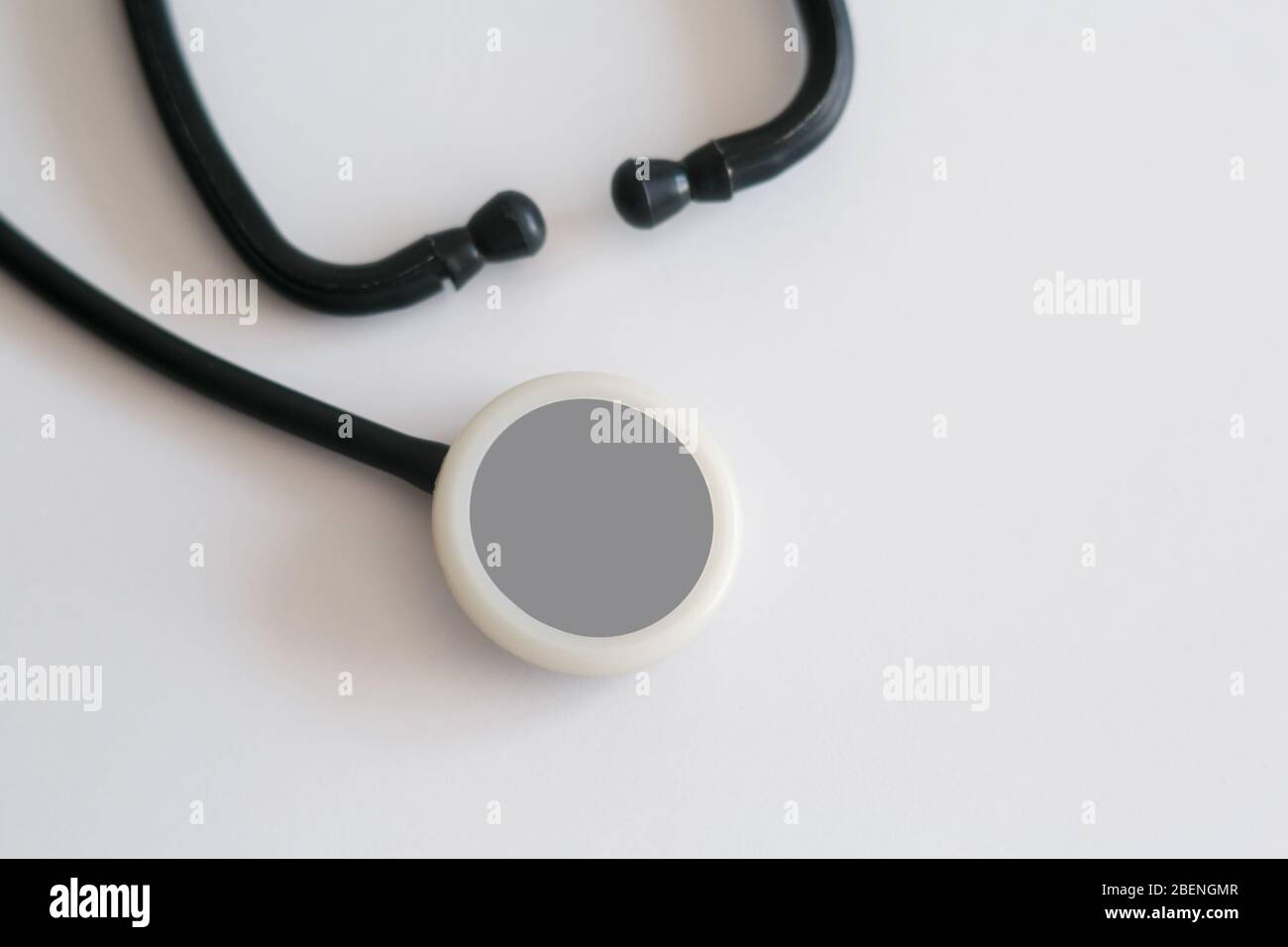 Black stethoscope isolated on white background. Healthcare Stock Photo ...