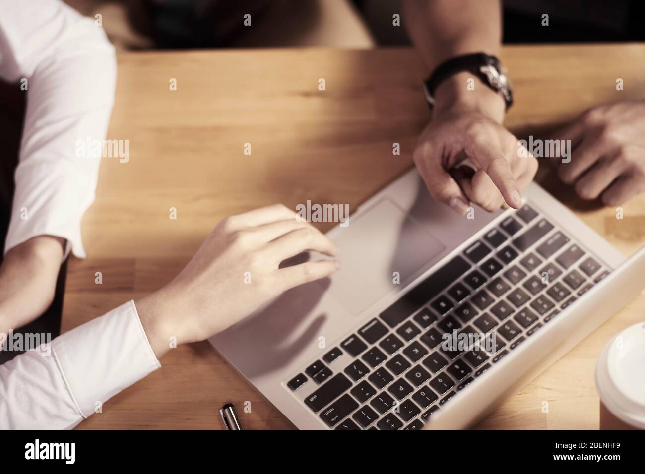 group of asian business people meeting in office using laptop computer Stock Photo