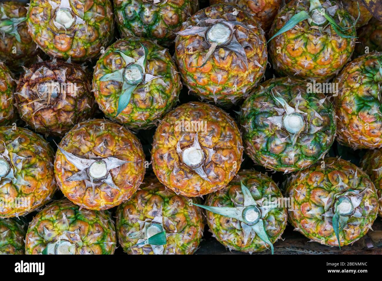 Pineapple stack at grocery on tropical marketplace outdoor,Samana