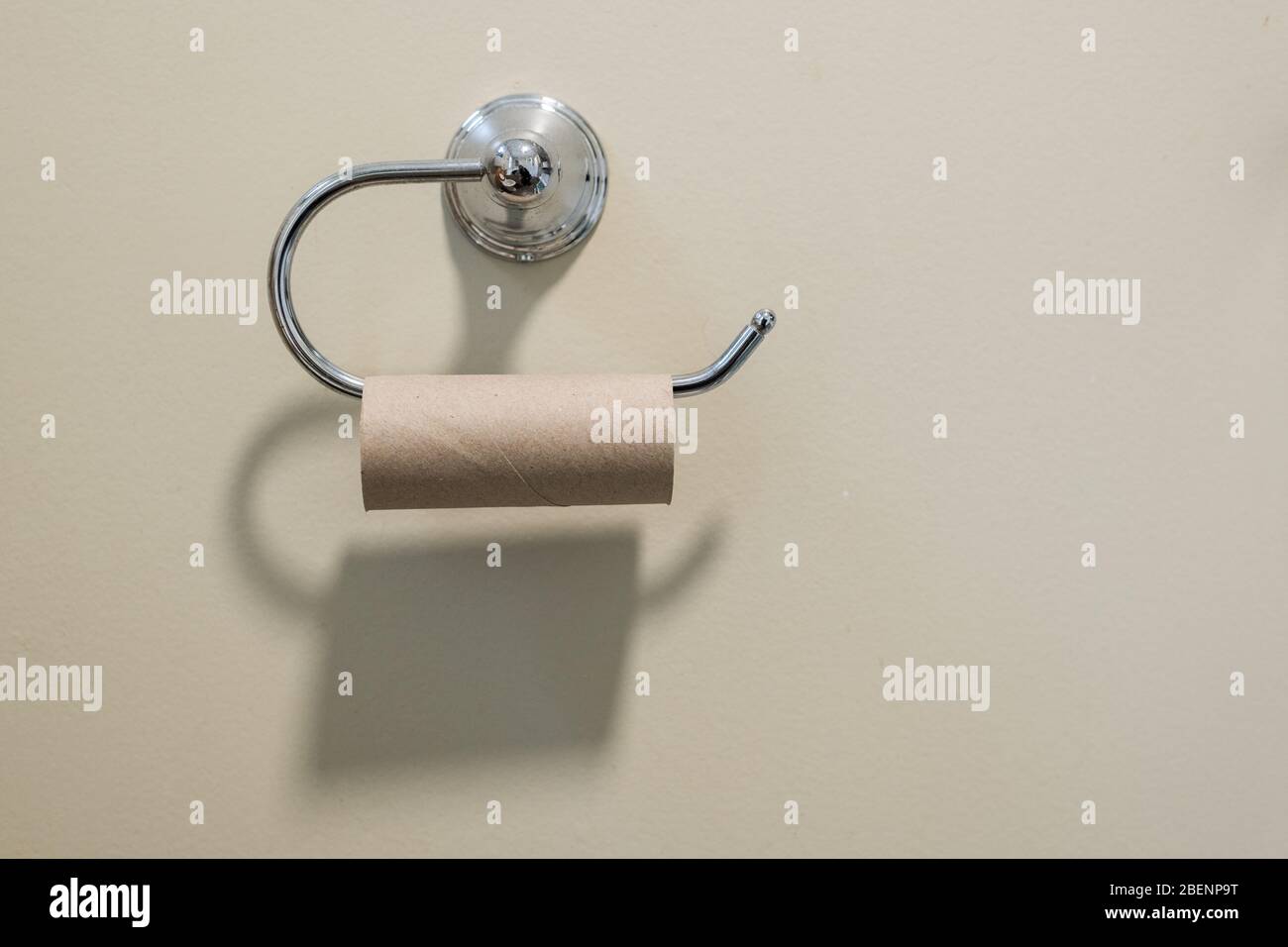 Tissue paper hang on the toilet wall. Empty of the roll Stock Photo - Alamy