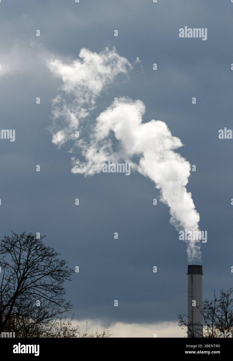 Berlin, Germany. 31st Mar, 2020. Smoke rises into the sky from a