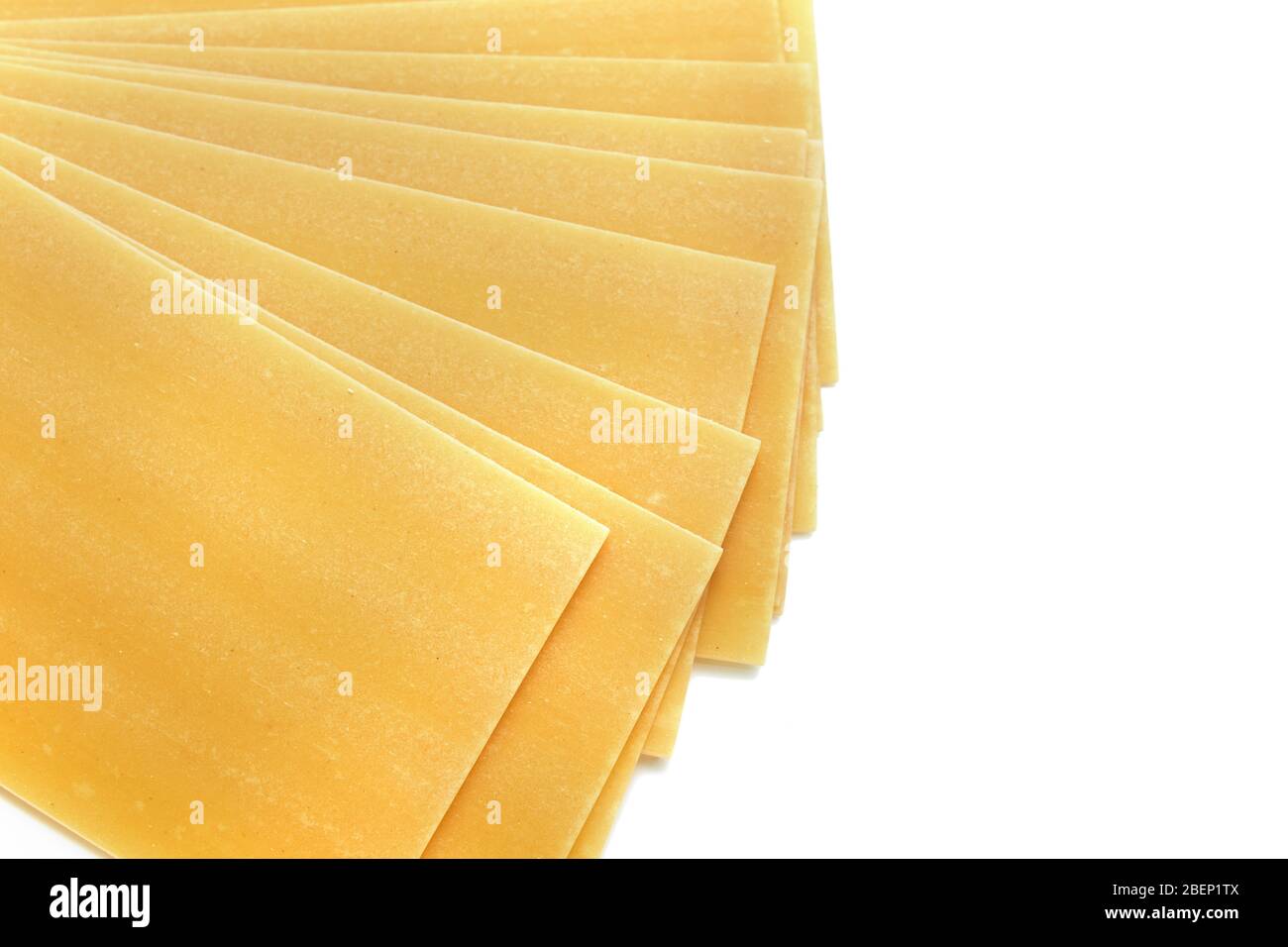 Dried lasagna pasta sheet isolated over the white background Stock