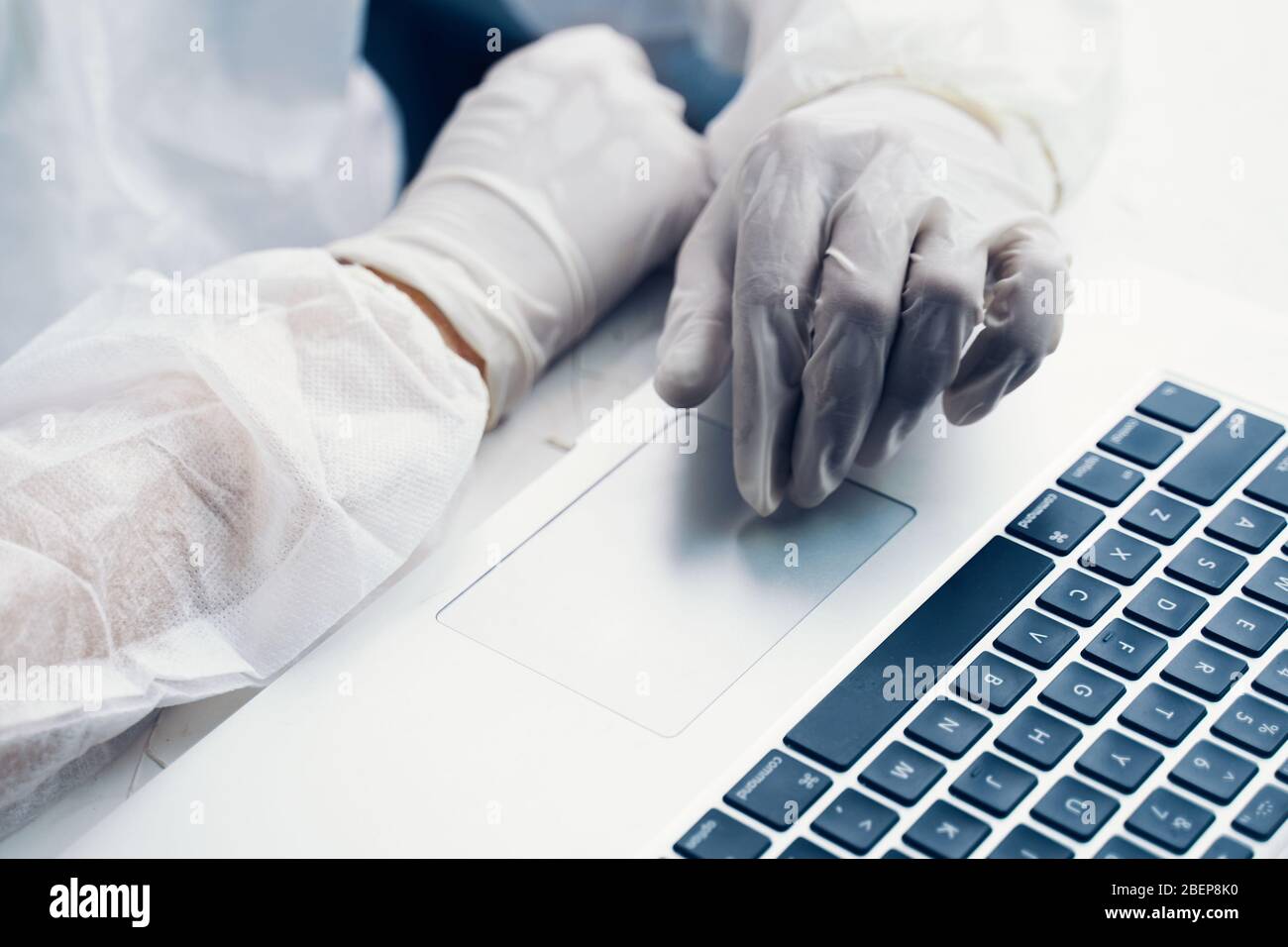 Bio hazard man with laptop. Business man working on laptop computer in ...