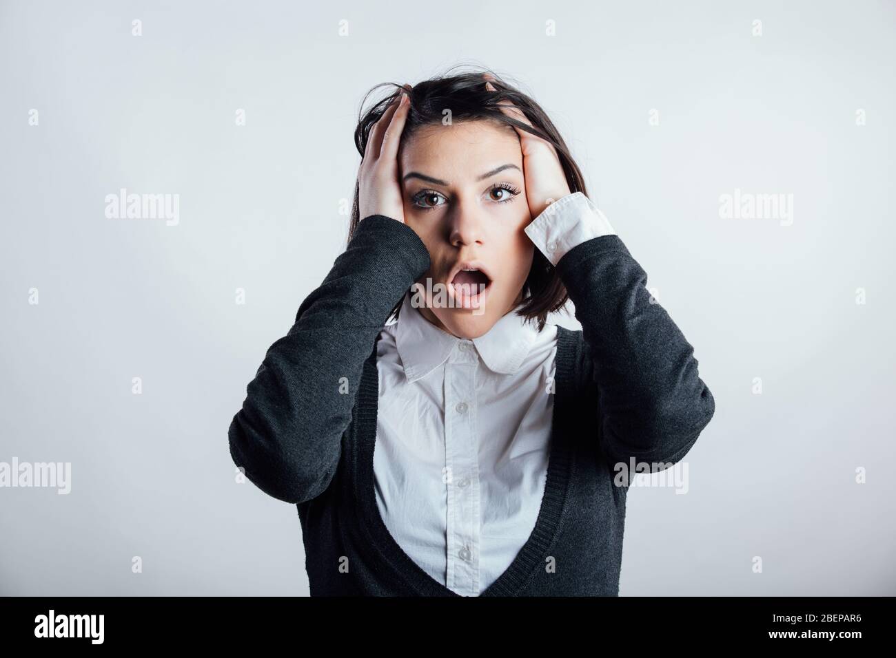 Excited woman looking surprised and amazed,speechless with mouth open.Shocked woman in disbelief.Emotional sad troubled woman expression.Emotional men Stock Photo