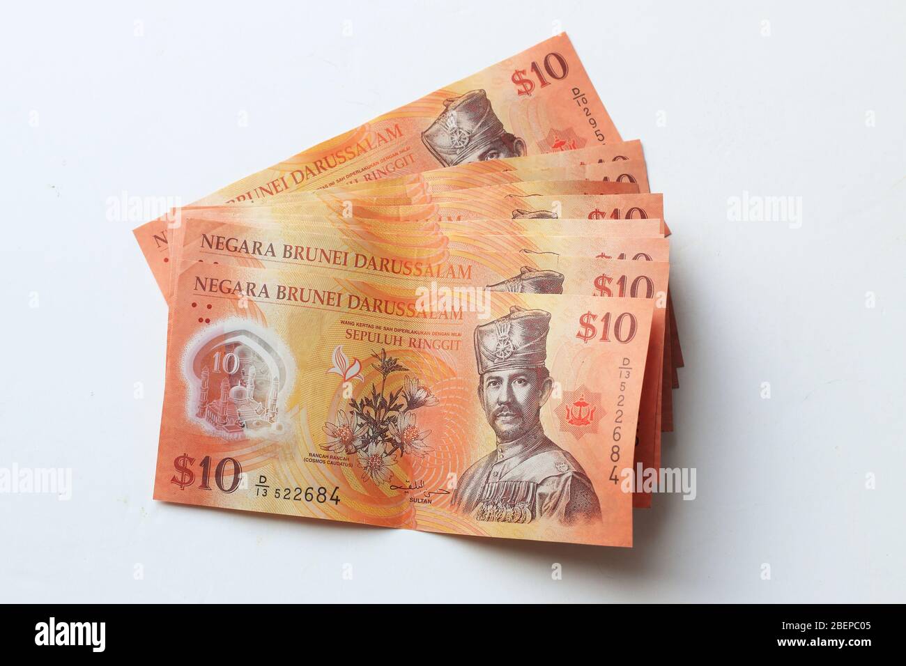 B$10, Ten Brunei dollars against white background Stock Photo